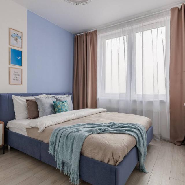 Designer two-bedroom apartment in the heart of St. Petersburg with sunset view 